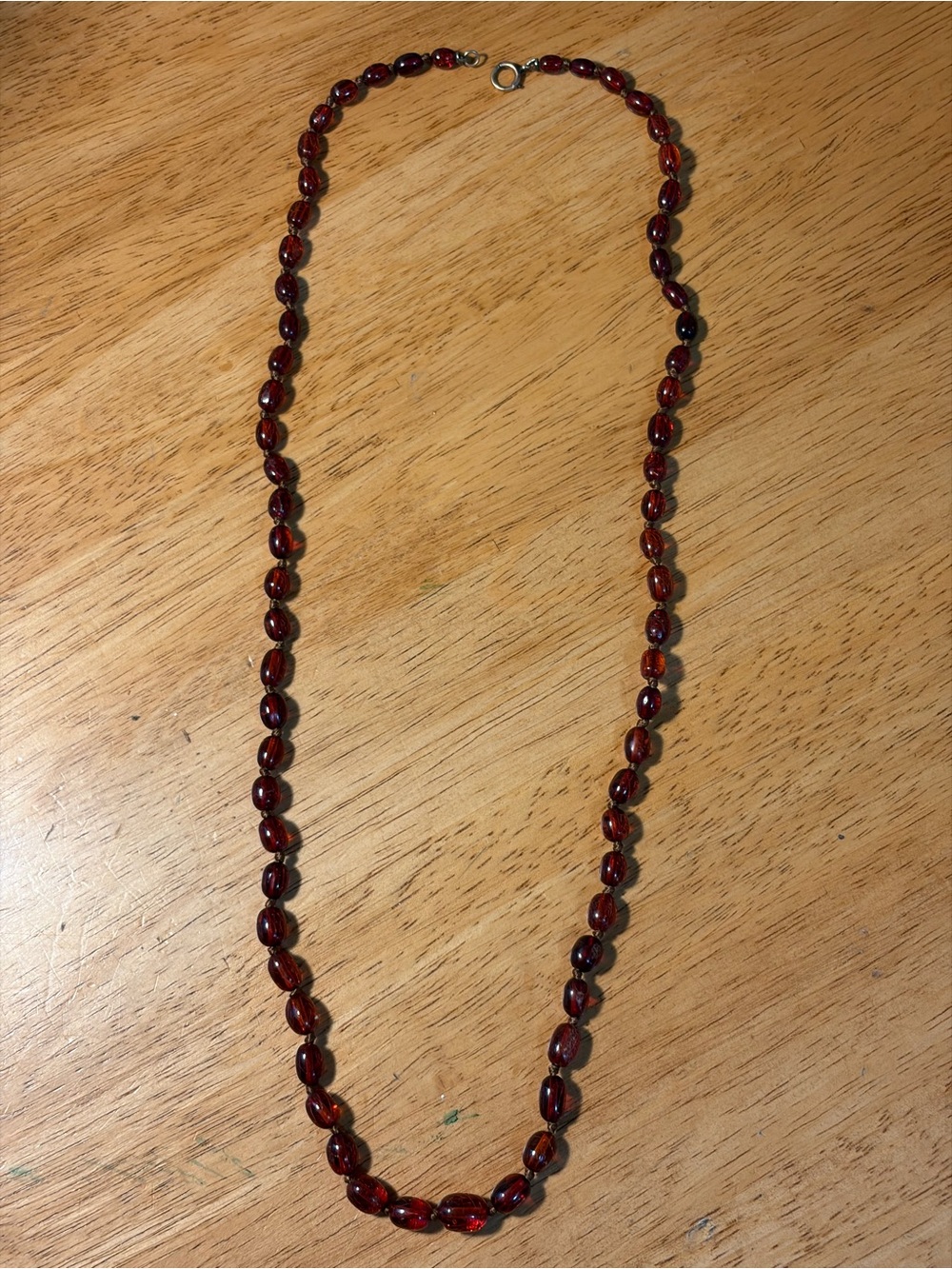 27" 1930S Lucite Cognac Necklace w/ Graduated Strand Of Beads.